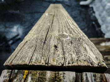 Close-up of old wooden bench