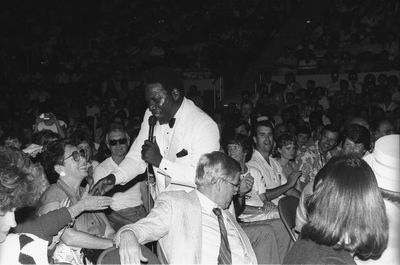 Group of people sitting at music concert