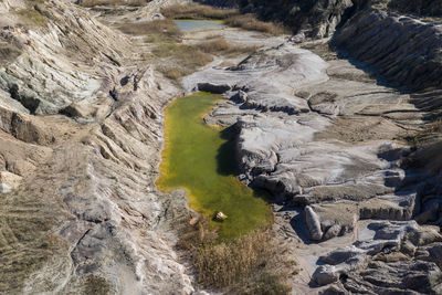 Drone view of opencast mine filled with water. aerial shot of artificial lake