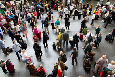 High angle view of people walking on street in city