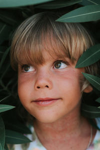 Portrait face of candid happy little kid boy of five years old with problem allergic skin