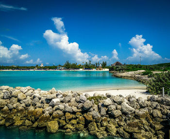 Scenic view of sea against cloudy sky