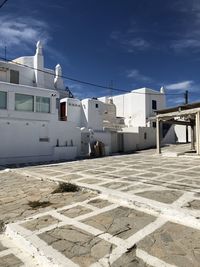 White building against blue sky