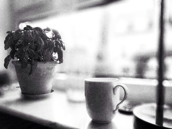 Close-up of coffee cup on table