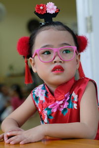 Portrait of cute girl looking away