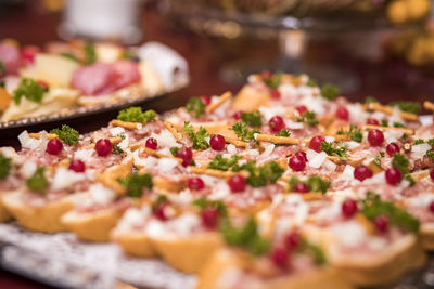 Close-up of appetizers in tray on table