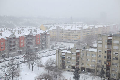 Block of residential buildings on a snowy day