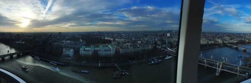 Aerial view of cityscape against sky