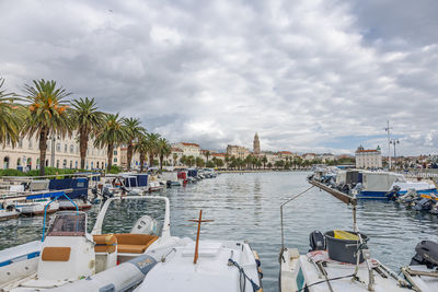 Boats in sea against sky