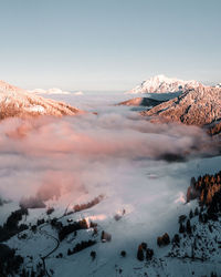 Scenic view of snow covered mountain against sky