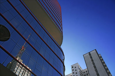 Low angle view of modern buildings against clear blue sky - copersucar building - paulista avenue