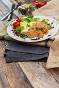 Close-up of breakfast served on table