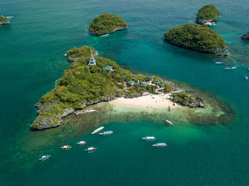 High angle view of rocks in sea