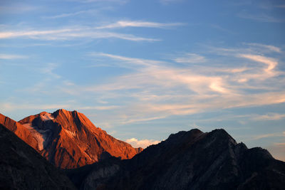 Scenic view of mountains against sky during sunset