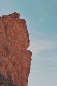 Scenic view of red rock formation against blue sky