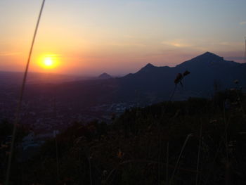 Scenic view of silhouette landscape against sky during sunset