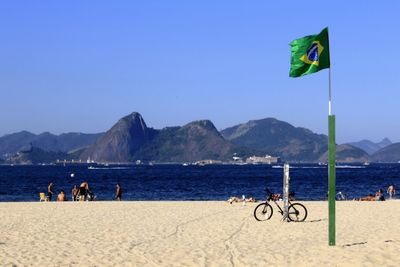 Scenic view of beach against clear sky