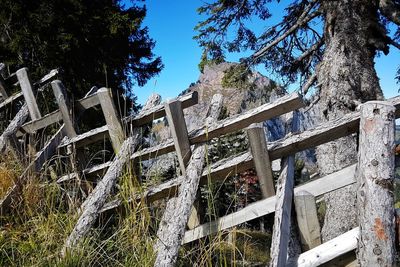 Low angle view of footbridge against sky