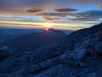 Scenic view of mountains against sky during sunset