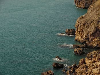 High angle view of sea and rocks