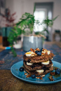 High angle view of pancakes in plate on table