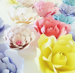 High angle view of colorful artificial flowers on table