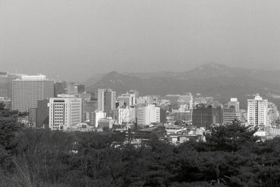Cityscape against clear sky