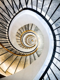 Directly below shot of spiral staircase in building