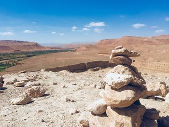 Rocks on land against sky