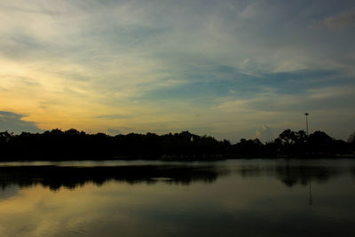 Scenic view of lake against sky during sunset