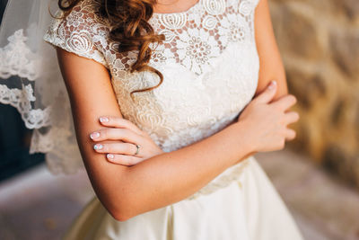 Midsection of woman wearing mask