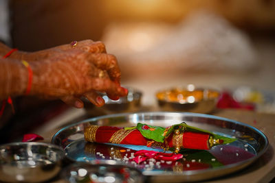 Close up photograph of traditional candid colorful of indian wedding