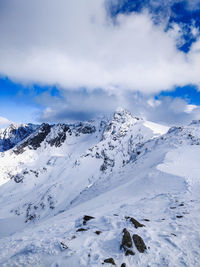 Scenic view of snowcapped mountains tatry
