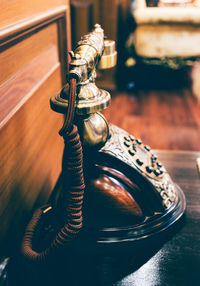 Close up of rotary phone on table