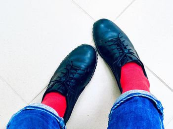 Low section of person wearing shoes