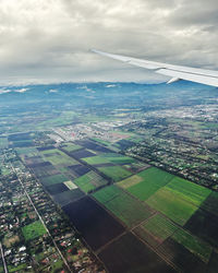 Aerial view of cityscape against sky