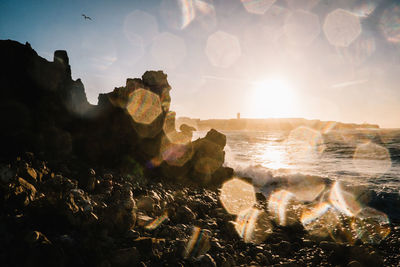 Panoramic view of sea against sky during sunset