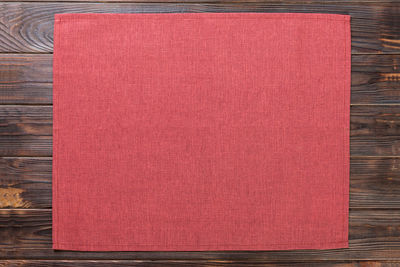 High angle view of red book on table