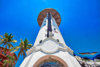 Low angle view of traditional building against blue sky