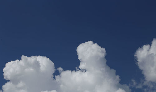 Low angle view of clouds in blue sky