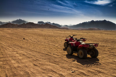 View of tractor on field against sky