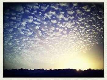 Scenic view of landscape against sky during sunset