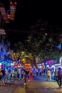 People in city at night