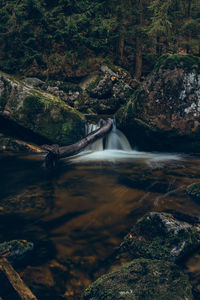 Waterfall on the river jedlova in the middle of the czech wilderness in the jizera mountains