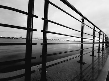 Bridge over sea against sky