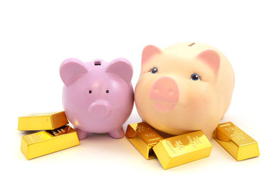 Close-up of coins on white background