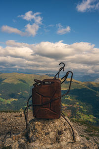 Burnt out gas cans on the mountain, south tyrol