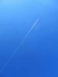 Low angle view of vapor trail in sky