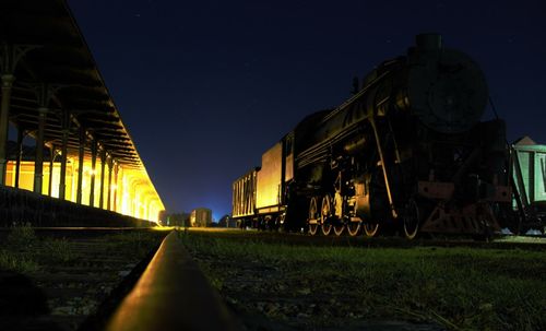 Railroad tracks at night