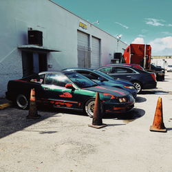 Cars on road against sky